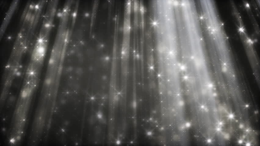 black and white background glittering particles in light beams loop