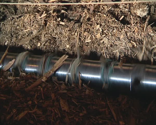 Sawdust and wood shaving container and special equipment feed heating boiler. Organic natural fuel. 