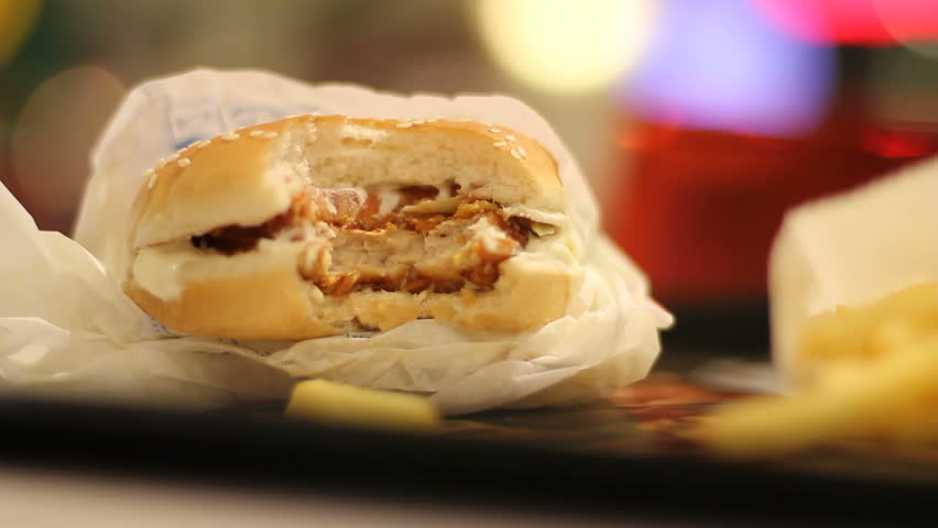 Fast-food burger bite