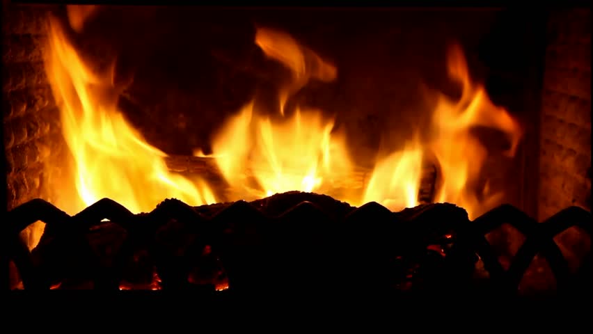 the dying embers in the fireplace