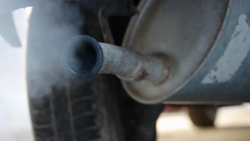exhaust pipe of an old little car 