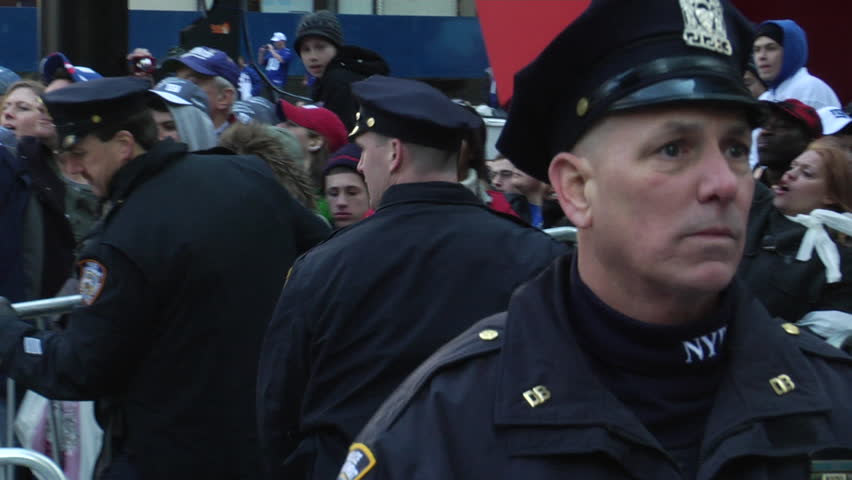 NEW YORK - FEBRUARY 7: Police move barricades during the ticker-tape parade in honor of the Super Bowl Champions New York Giants on February 7, 2011 in New York. 