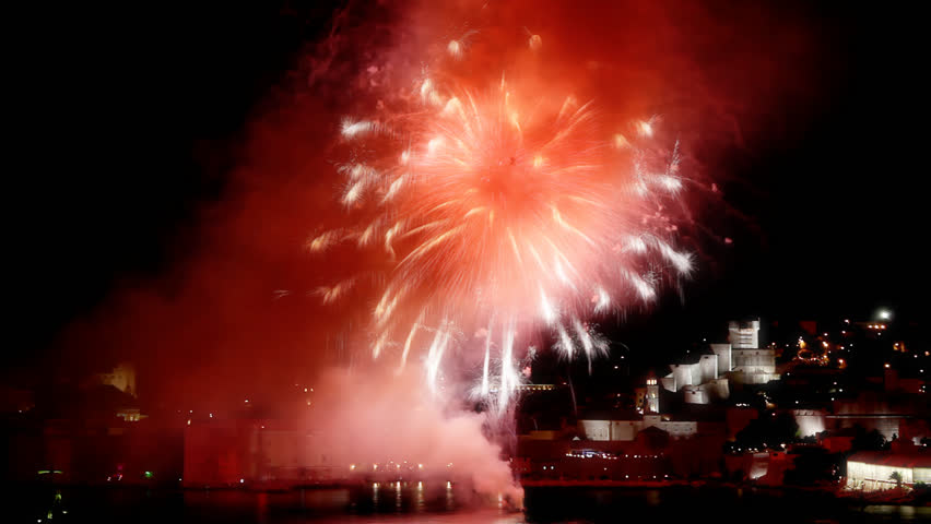Opening of the Dubrovnik summer festival with old city walls by night with fireworks. Wide time effect for more dramatic look and intense colors.