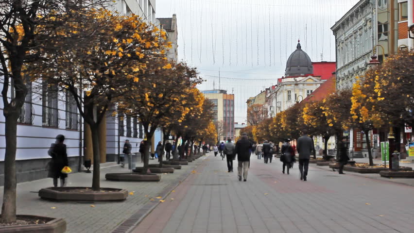 IVANO-FRANKIVSK, UKRAINE - NOVEMBER 11: (Time lapse view) People on beautiful pedestrian street of city on November 11, 2011 in Ivano-Frankivsk, Ukraine. City was founded in 1662 by Polish magnate Andrei Potocki.