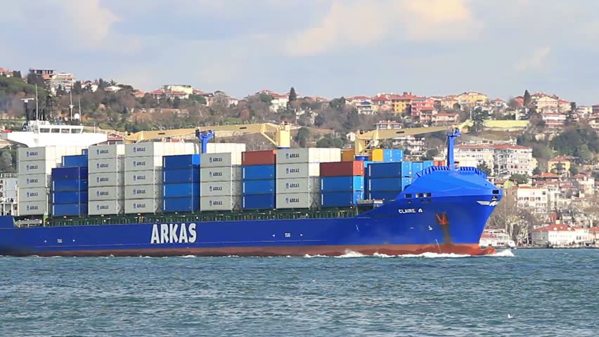 ISTANBUL - MARCH 04: Container Ship, CLAIRE (IMO: 9379387, Turkey) sails with full of cargo in Bosporus on March 04, 2012 in Istanbul. 50,000 ships pass through the Straits every year 