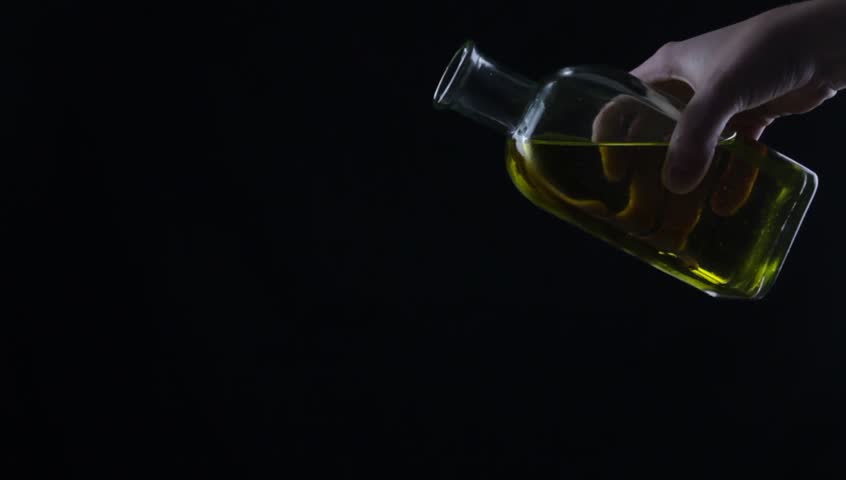 pouring extra virgin olive oil