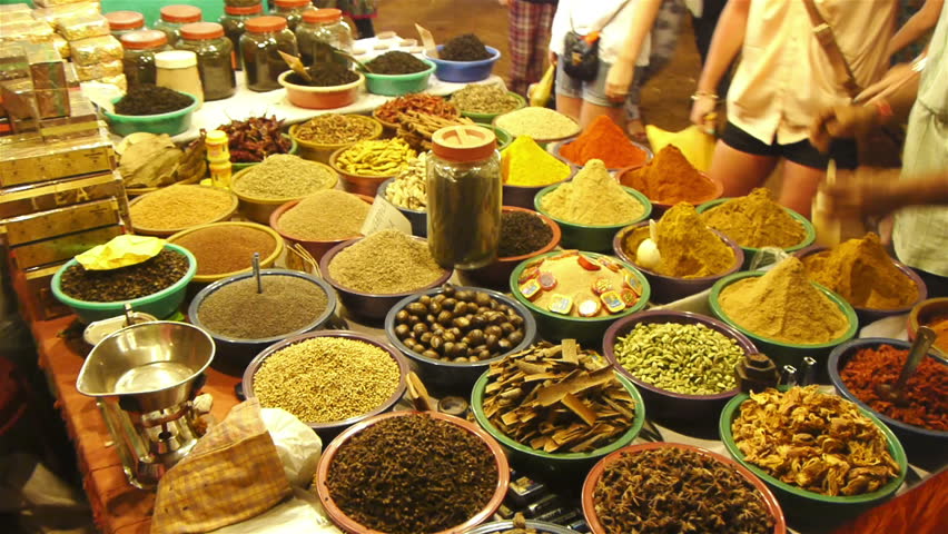 Spices lined in a row in an east asian market 