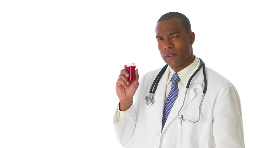 Medical doctor holding a prescription pill bottle
