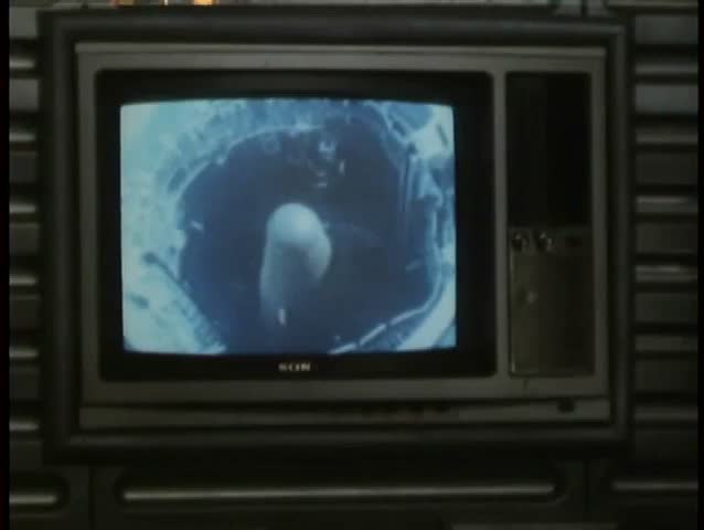 View of missile launch on tv set