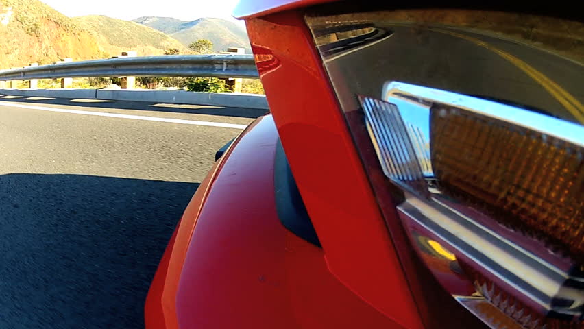Bodywork Cabriolet convertible vehicle on a tarmac road