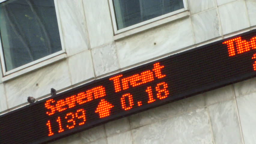 CLOSE UP, stock ticker, Canary Wharf, London, England, UK