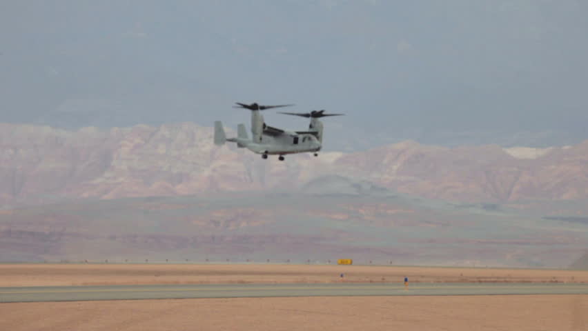 ST GEORGE, UTAH - MAR 17: Aircraft V-22 Osprey VTOL approaches to land in high desert wind on March 17, 2012  in St George, Utah. USAF, Marines, Navy and NATO allies for troop movement in Iraq and Afghanistan.