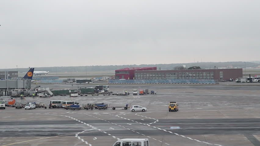 FRANKFURT - OCTOBER 21: Lufthansa Airbus A340 passenger plane drives to arrival gate. Other aircraft drive past on October 21, 2011. Lufthansa is Germany's biggest airline. 