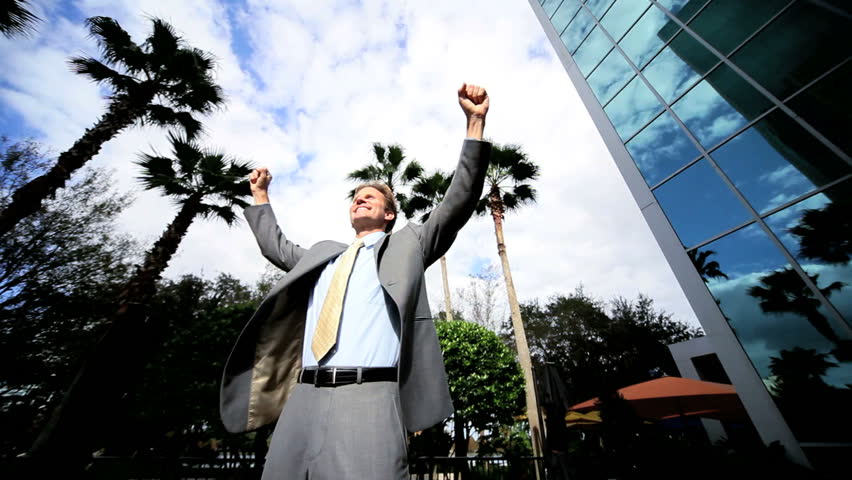 Successful business executive celebrating 