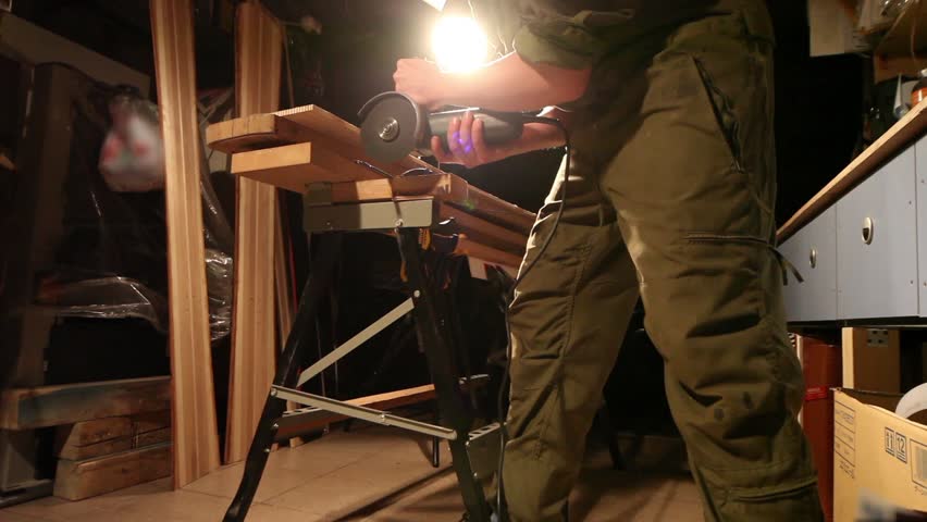 Workman in joinery workshop.
