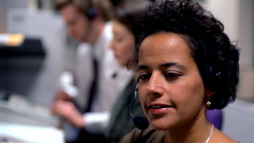 Group of telemarketers on the phone