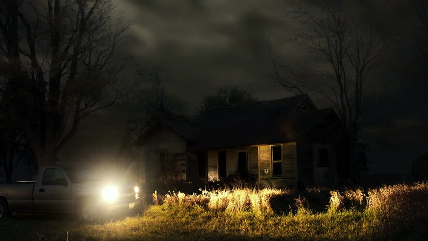Timelapse night to day of haunted house.