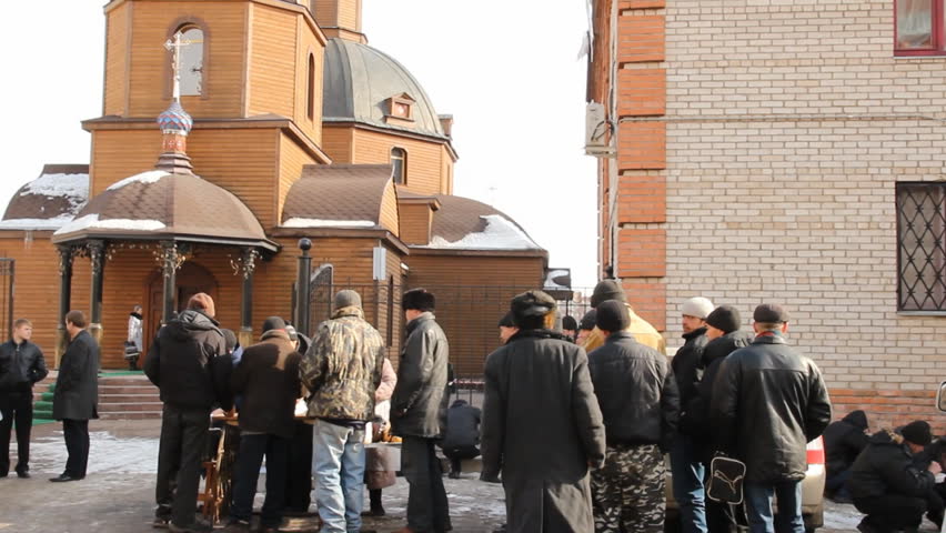 MARCH 1 - UFA, RUSSIA: 
Crowd waits in line for food at during distribution of hot meals to homeless persons on March 1, 2012 in UFA, Russia. 