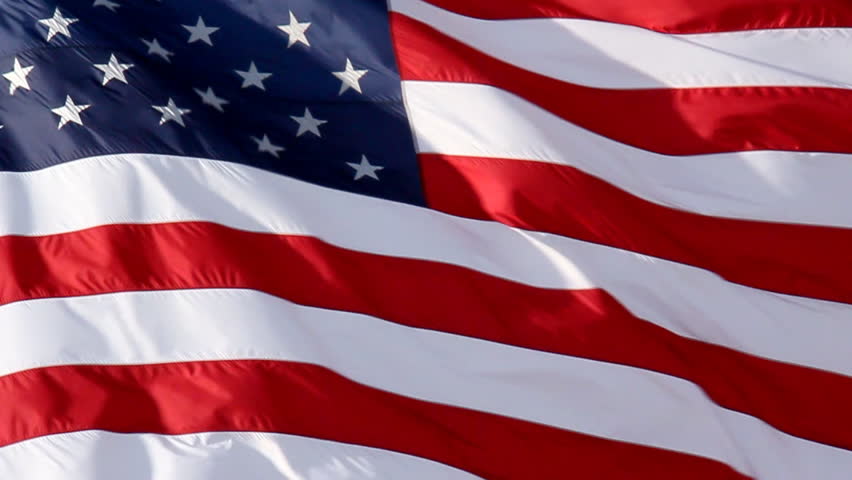 American Flag Slow Waving. Close up of American flag waving. Filmed at 60 fps and slowed down to 30 fps.
