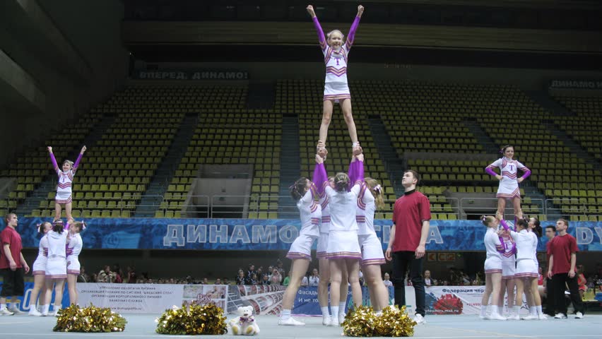 MOSCOW - MAR 24: (Timelapse View) Talisman team participates in Annual competitions of Championship of Moscow on cheerleading in Dynamo sports palace, on March 24, 2012 in Moscow, Russia