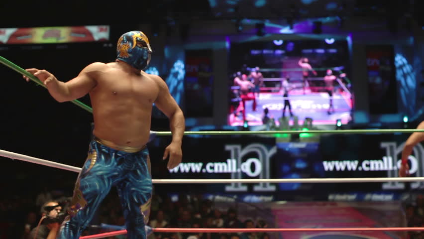 MEXICO CITY - DECEMBER 19: Ringside view of a lucha libre, famous mexican wrestling competition at Arena Mexico on DECEMBER 19, 2011 in Mexico City, Mexico. 