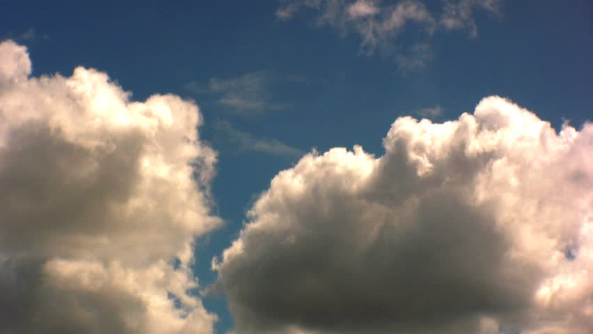 Large aircraft taking off through heavy clouds