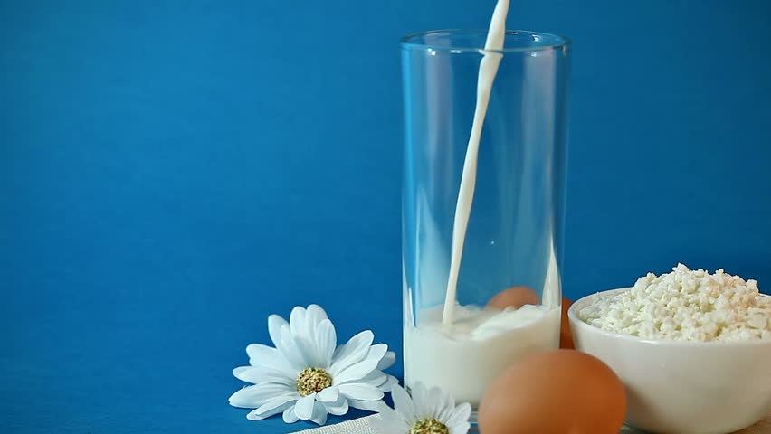 milk pouring into glass and dairy products HD video 1920x1080
