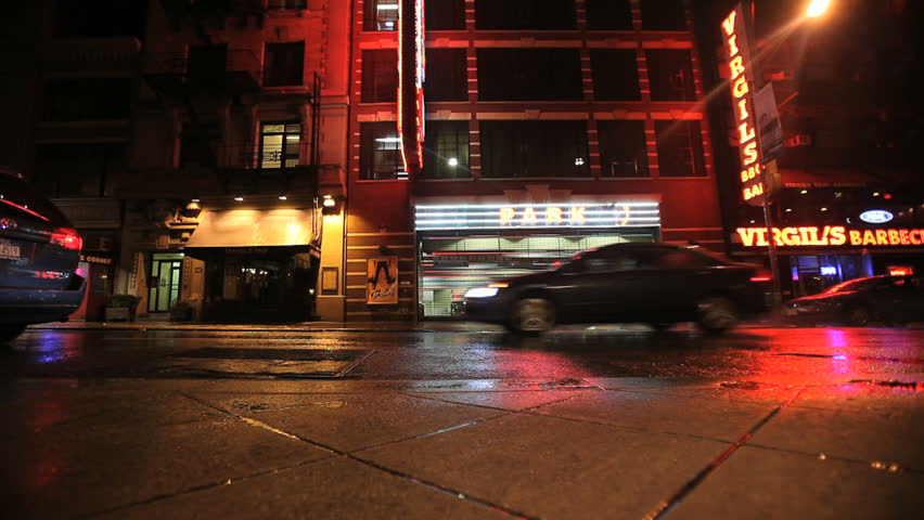 New York - Circa 2009: New York City in 2009. A person hailing a taxi cab in New York city, New York.