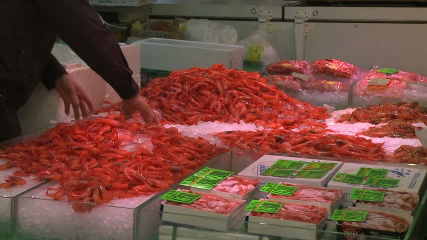 TOKYO, JAPAN - CIRCA 2008: shrimp sorting in Tsukiji wholesale market