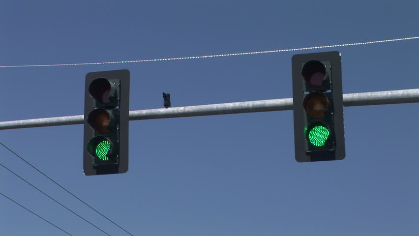 Two traffic signals changing from green to yellow to red, Vancouver, Washington.	 Format: NTSC HDV Compression: MotionJPEG-A Camera: Sony HVR-Z1U Size: 1080i (1920 x 1080) Sound: No