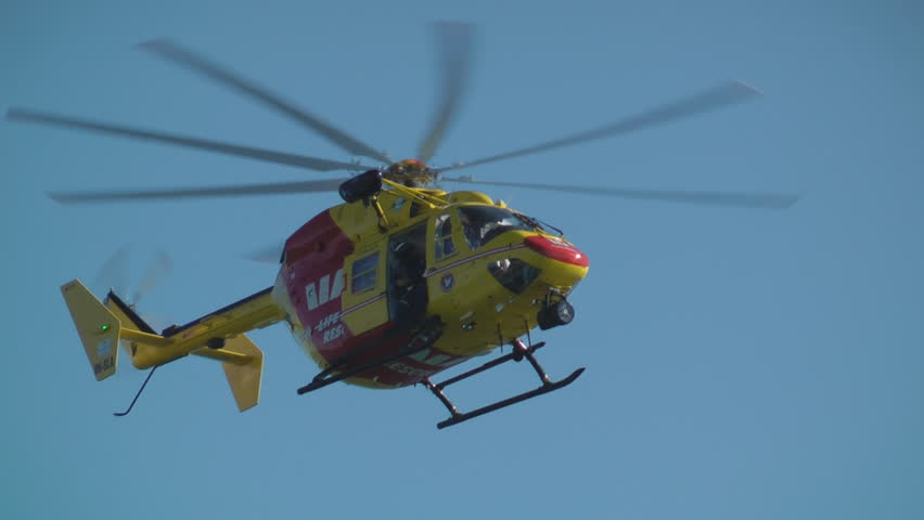 SYDNEY, AUSTRALIA â JUNE 2012: A Westpac lifesaver rescue helicopter flies during a search and rescue mission on June 9, 2012 near La Perouse, Sydney, Australia.