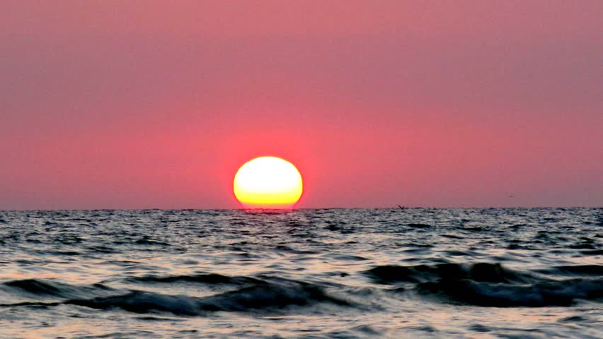 silhouette people on sunset sea time lapse 