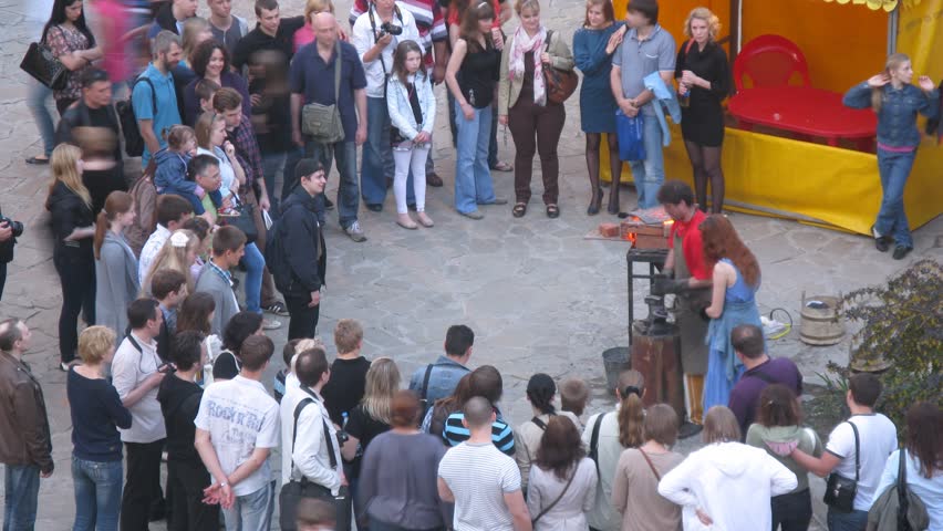 MOSCOW - MAY 19: (Timelapse View) People stand near attraction Blacksmith in cultural entertainment complex Kremlin in Izmailovo, on Annual action Night of Museums, on May 19, 2012 in Moscow, Russia

