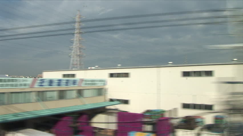 View from a moving train in Kyoto Japan