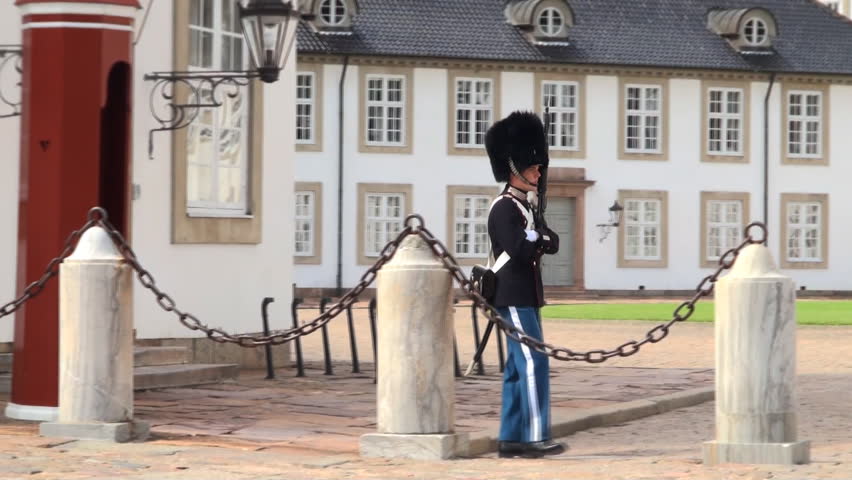 FREDENSBORG, DENMARK - JUNE 22, 2011: Royal Guard on duty at royal Fredensborg Slot palace on June 22, 2011 in Fredensborg, Denmark