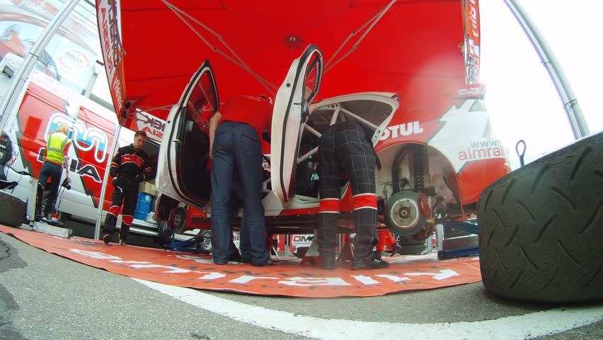 MOSCOW - APR 21: (Timelapse View) Team ALM RUSSIA prepares the car for start, on Rally Masters Show, on April 29, 2012 in Moscow, Russia