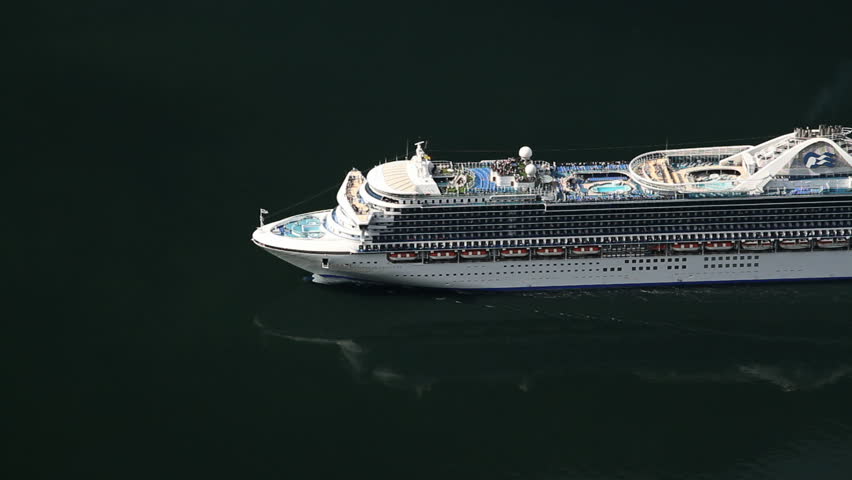 GEIRANGER, NORWAY - JUNE 22: Cruise ship Caribbean Princess approaching the Geiranger Fjord on June 22, 2012 in Geiranger, Norway. Overhead view of the ship