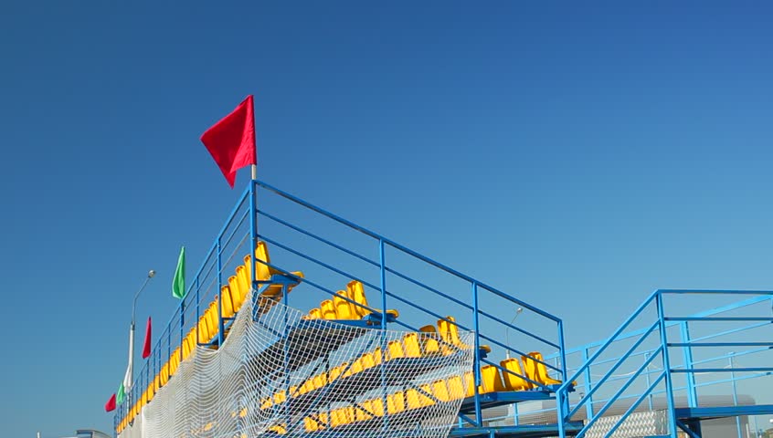 Waving flags on the football stadium