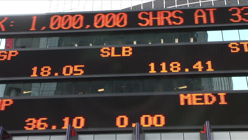 New York, NY - CIRCA March 2006: An electronic stock ticker billboard shows the world how much their favorite companies are worth