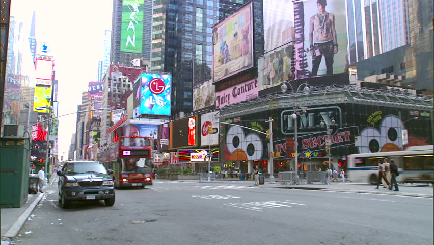 New York, NY - CIRCA 2006: Traffic goes down the street in Times Square during the day, when it is least crowded