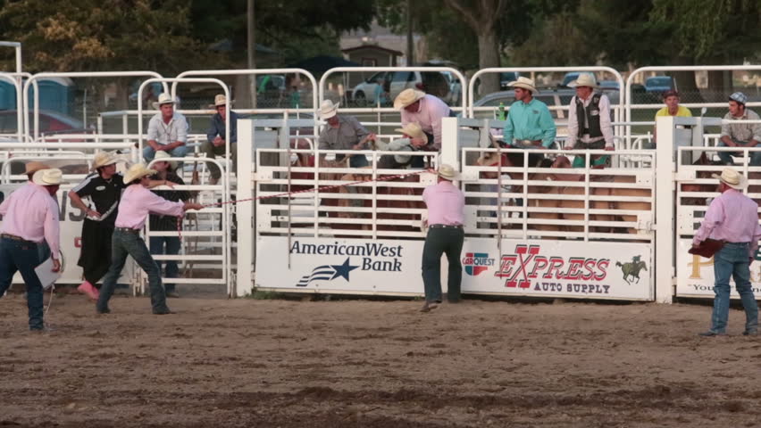 MOUNT PLEASANT, SANPETE, UTAH 3 JUL 2012: Annual rodeo and community fund raising competitive. Economic boost. Rodeo saddle bronc horse ride slow. Rural fair, rodeo and community celebration