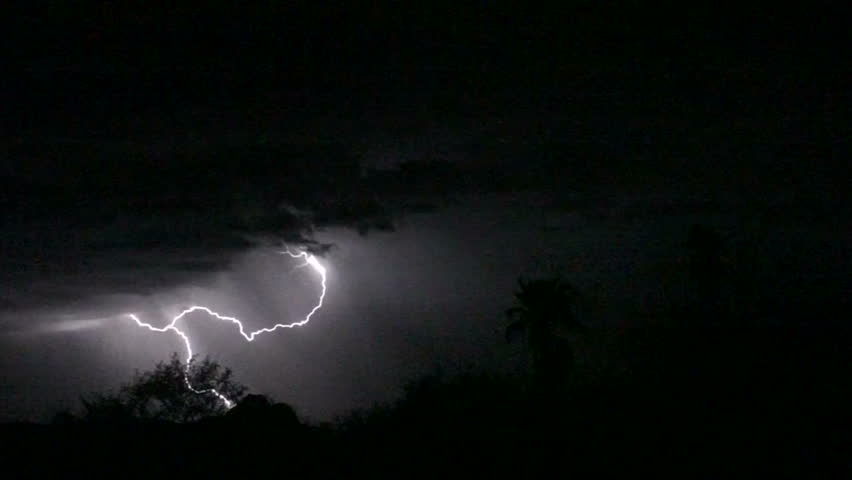 Lightning strikes light up night sky during intense summer heat. 