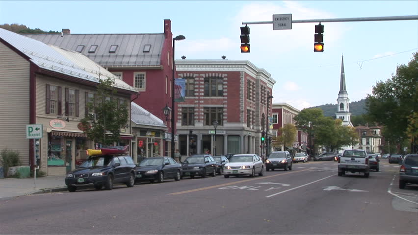Montpelier, Vermont - CIRCA September 2007: Traffic rolls down a quiet country town during the day
