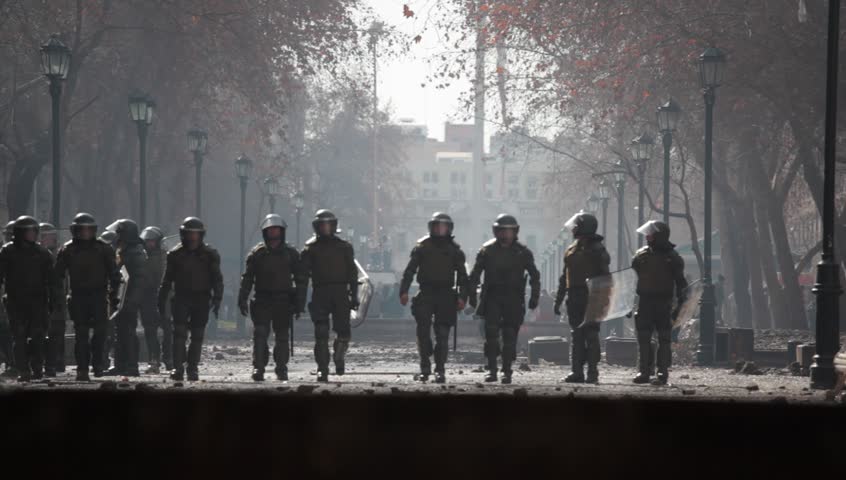 SANTIAGO, CHILE - AUGUST 9: Chilean riot disperse protesters during a student strike on August 9, 2011 in Santiago, Chile.