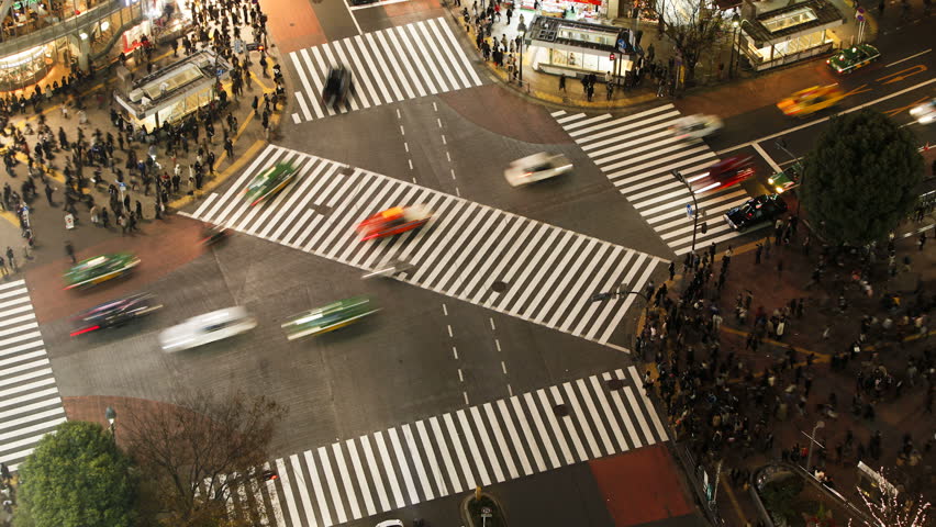 TOKYO, JAPAN - CIRCA MAY 2011: people crossing the famous crosswalks at the centre of Shibuyas fashionable shopping and entertainment district