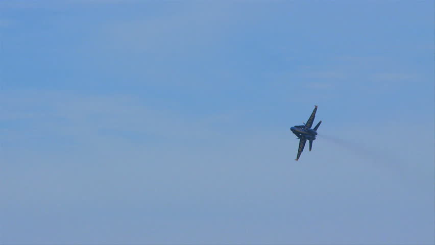 QUONSET, RHODE ISLAND - CIRCA JUNE 2012: Blue Angels - 6 single jet flyover with bottom angled to camera