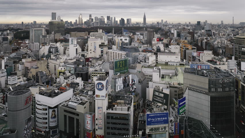 TOKYO, JAPAN - CIRCA MAY 2011: Moving clouds over Shinjuku business, shopping and entertainment district, viewed from Shibuya