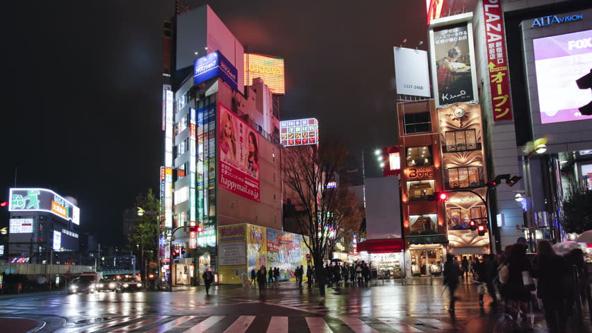 TOKYO, JAPAN - CIRCA MAY 2011: Streets at night seen from driving car, Shinjuku Ward