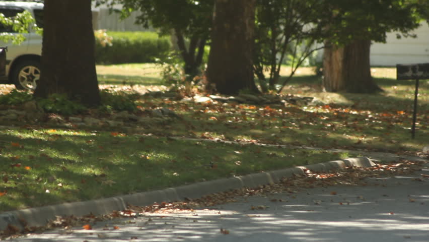 An overweight man is walking for exercise.