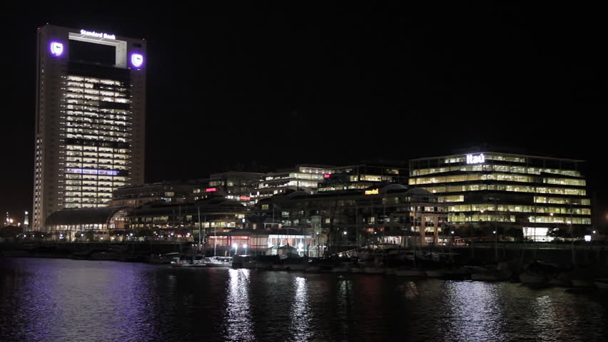 BUENOS AIRES - JULY 25: Night view of office buildings at Puerto Madero harbor on July 25, 2012, in Buenos Aires, Argentina. P.M. is a preferential area for international businesses in the city.